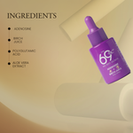 Purple skincare serum bottle with ingredients listed on a beige background